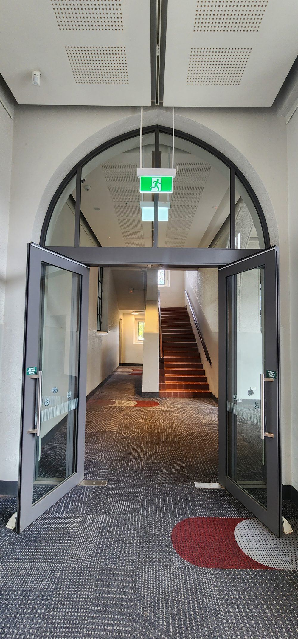 Aluminium partition system fitted along a corridor at Christchurch Boys High School